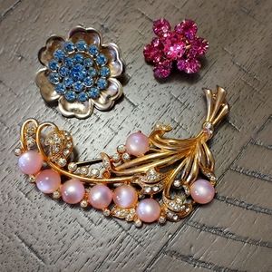 Three Brooches